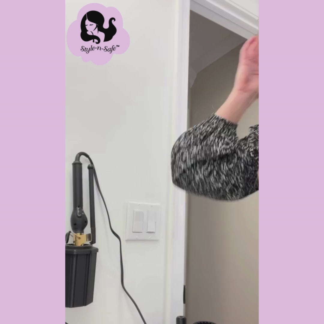 Demo video showing use of wall mounted curling iron holder